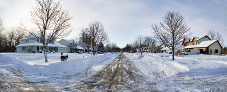 Typical neighborhood after six inches of snow fell overnight.の写真素材