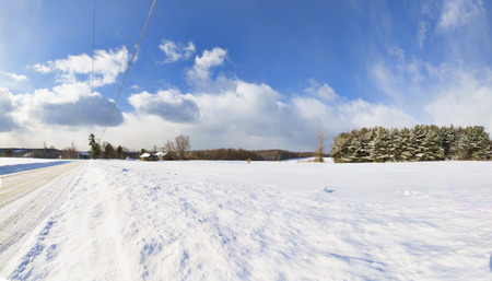 Snow covered, abandoned farm buildings in a wintery Western New York landscape.の写真素材