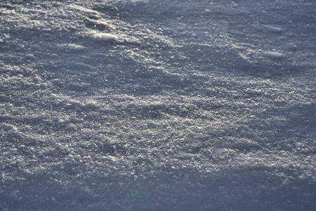 Details of three feet or more of accumulated powdery snow on a mid-Winter morning.の写真素材