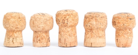 Four corks in a row の写真素材