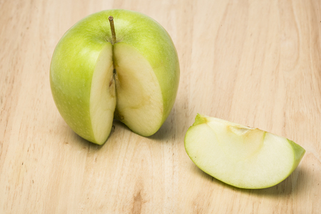 green apple on woodenの写真素材