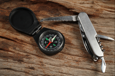 compass on old log textureの写真素材