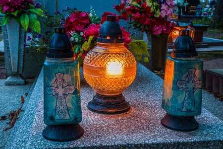 Colorful candles on the cemetery at All Saints Day, Polandの写真素材