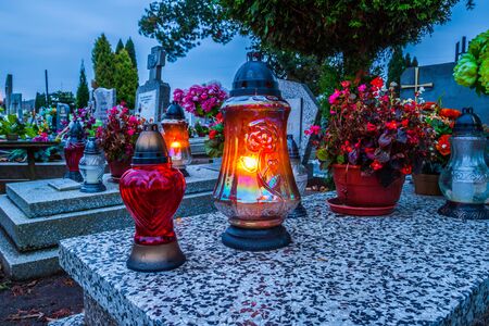 Colorful candles on the cemetery at All Saints Day, Polandの写真素材