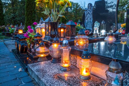 Colorful candles on the cemetery at All Saints Day, Polandの写真素材