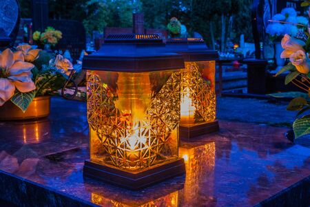 Colorful candles on the cemetery at All Saints Day, Polandの写真素材