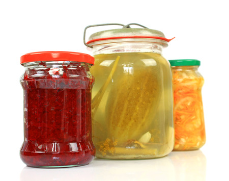 Jars of pickles isolated on white backgroundの写真素材