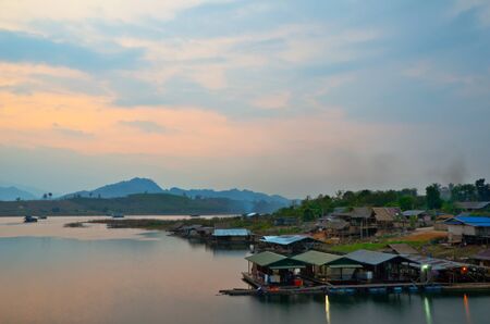 Thai Floating village on the River in Sangkraburi Kanchanaburi Province Border of Thailand in The Morningのeditorial素材