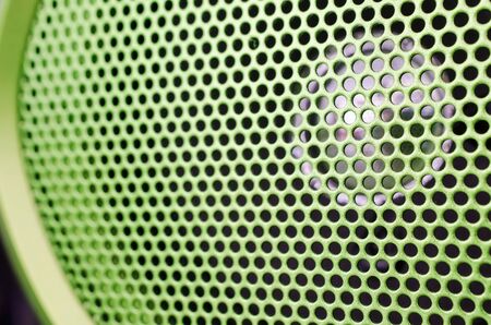 Green speaker grille close-up  Use for texture or background  Shallow depth of fieldの写真素材