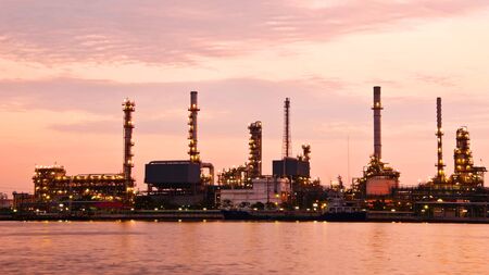 Petroleum oil refinery factory over sunrise in Bangkok, Thailand This is generic style in Thailand  