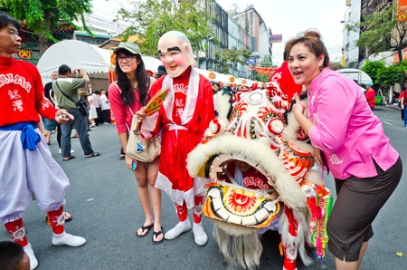 BANGKOK, THAILAND - FEBRUARY 10: Unidentified people celebrate with chinese lion at Yaowarat Road in Chinatown district during the Chinese New Year celebrations on February 10, 2013 in Bangkok, Thailandのeditorial素材