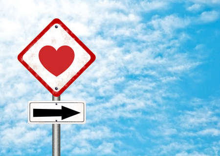 road sign with love on blue sky backgroundの写真素材