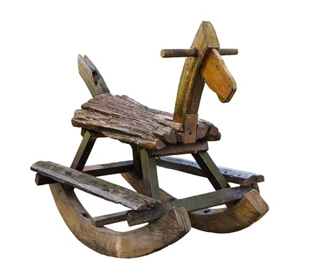 Old wooden rocking horse isolated on white backgroundの写真素材