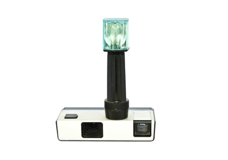 Old pocket vintage camera with flashbulb  against white background Clipping path included to replace...