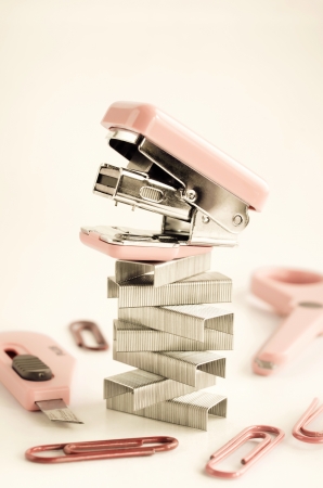 Pink stapler with office accessories   Processed with vintage style の写真素材