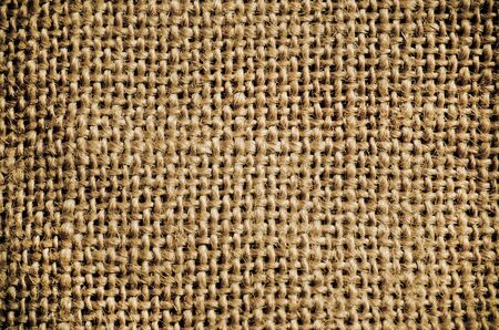 Detail and pattern of sackcloth textured background  with vignette
