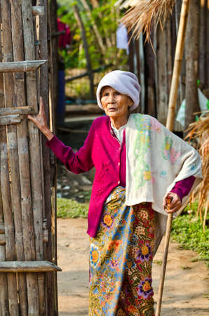 KANCHANABURI THAILAND-January 29  An unidentified old Mon ethnic woman poses for the photo at her house on January 29, 2012  at KANCHANABURI THAILAND  Mon are an ethnic group spread in Thailand のeditorial素材