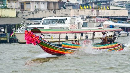 THAILAND - FEBRUARY 04    Unidentified tourists enjoy  traveling on long tail boat  in Chao Phraya...