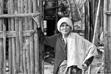 KANCHANABURI THAILAND-January 29  An unidentified old Mon ethnic woman poses for the photo at her house on January 29, 2012  at KANCHANABURI THAILAND  Mon are an ethnic group spread in Thailand のeditorial素材