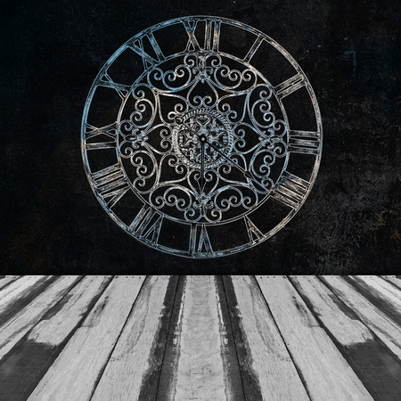 Abstract classic clock on wall with planks floorの写真素材