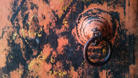 Traditional ancient door pattern in Thai templeの写真素材