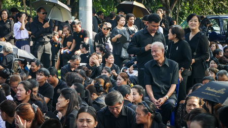 NAKHON PATHOM, THAILAND - OCTOBER  26 : People stand on the queue to join The Royal Cremation for His Majesty the late King Bhumibol Adulyadej  at Nakhon Pathom,Thailand on October 26, 2017のeditorial素材