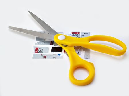 Pieces of credit card cut up with sissorsの写真素材