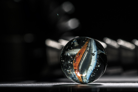 Orange and blue glass marbleの写真素材