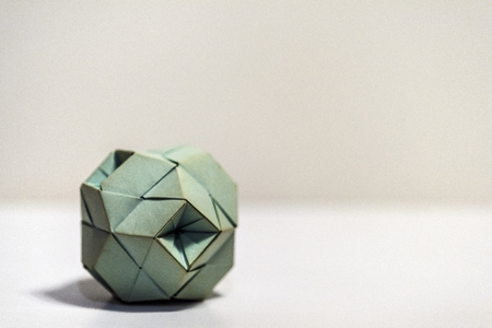 Green origami paper polyhedronの写真素材