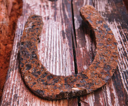 Close-up of an old rusty lucky horseshoeの写真素材