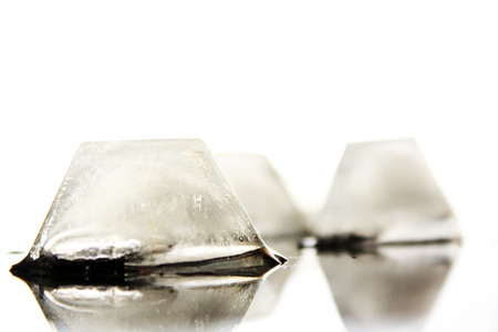 several ice cubes in the form of ground without backgroundの写真素材