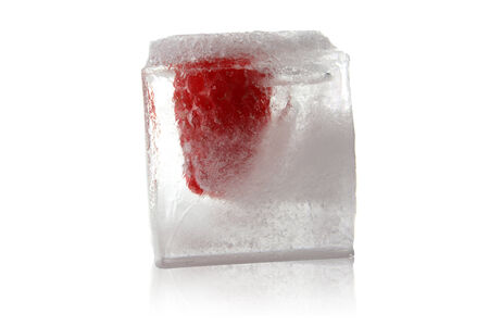 Raspberry frozen in ice cubeの写真素材