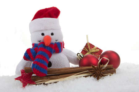 snow man  toy  with christmas decorationの写真素材