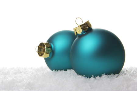 green christmas balls isolated with white backgroundの写真素材