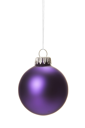 purple christmas balls isolated with white backgroundの写真素材