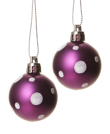 purple christmas balls isolated with white backgroundの写真素材