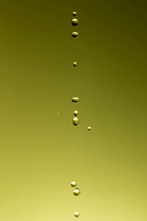 The fluid motion of water splashing as it is poured  の写真素材