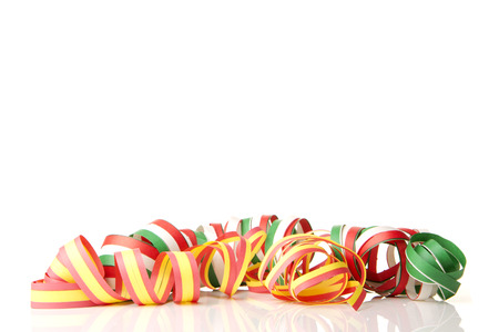 streamers and confetti as decoration for parties, sylvester with white background の写真素材