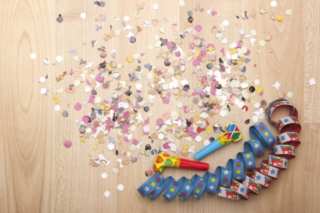 streamers and confetti as decoration for parties, sylvester with white backgroundの写真素材