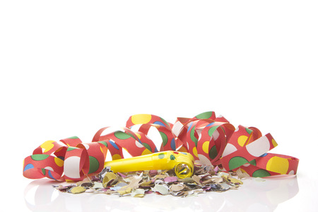 streamers and confetti as decoration for parties, sylvester with white background の写真素材