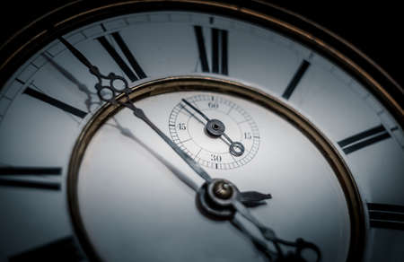 Close up of the face of an antique clock.の写真素材