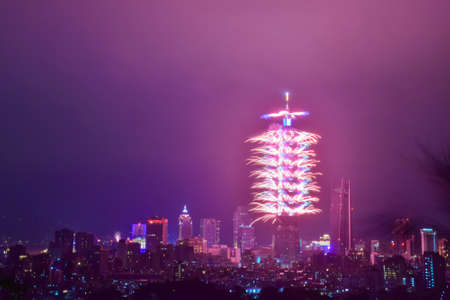 Beautiful fireworks in the night sky over the city of Bangkok, Thailandの写真素材