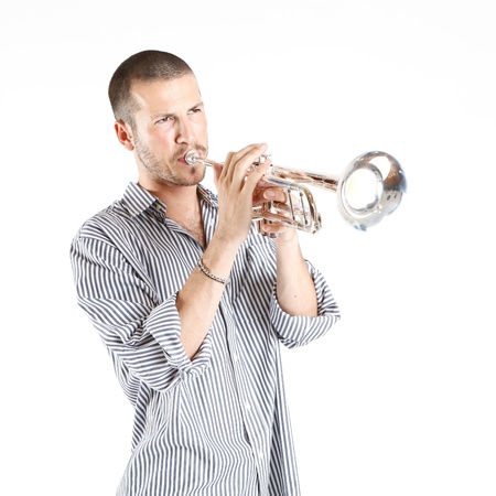young man playing the trumpetの写真素材