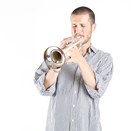 young man playing the trumpetの写真素材