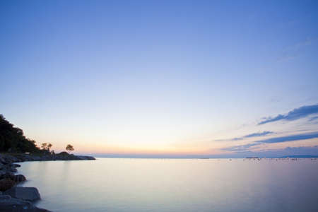 gulf of trieste at sunsetの写真素材