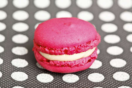 Beautiful little cake on colorful wallpaper backgroundの写真素材