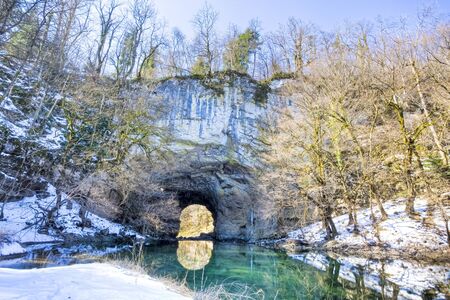 winter river natural tunnelの写真素材