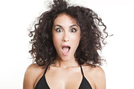 young girl surprise face expressionの写真素材