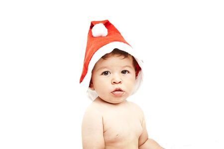 cute little baby with christmas hatの写真素材