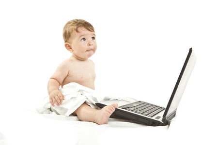 cute little baby using a pcの写真素材